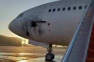 Several rockets hit Baghdad airport compound, civilian plane damaged