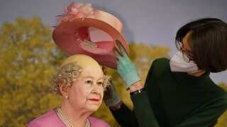 German wax museum leaves Queen Elizabeth's statue bald under her hat