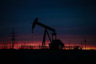 With oil markets tightening, OPEC and its allies agree to small increase in output