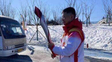 Winter Olympics: Torch begins COVID-shortened trek past Beijing landmarks Winter Olympics: Torch begins COVID-shortened trek past Beijing landmarks