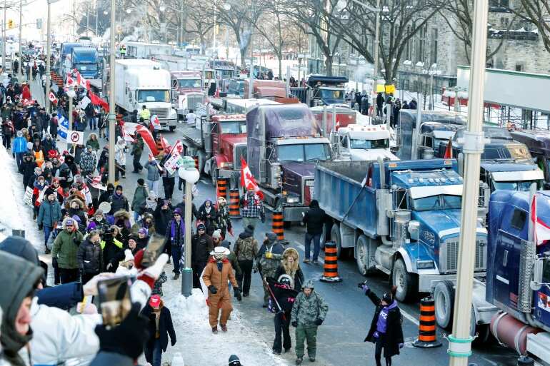 Thousands march on street of Ottawa, Sikh protesters join truckers
