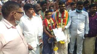 This Indian poll candidate arrives with his bride to file nomination in full wedding attire