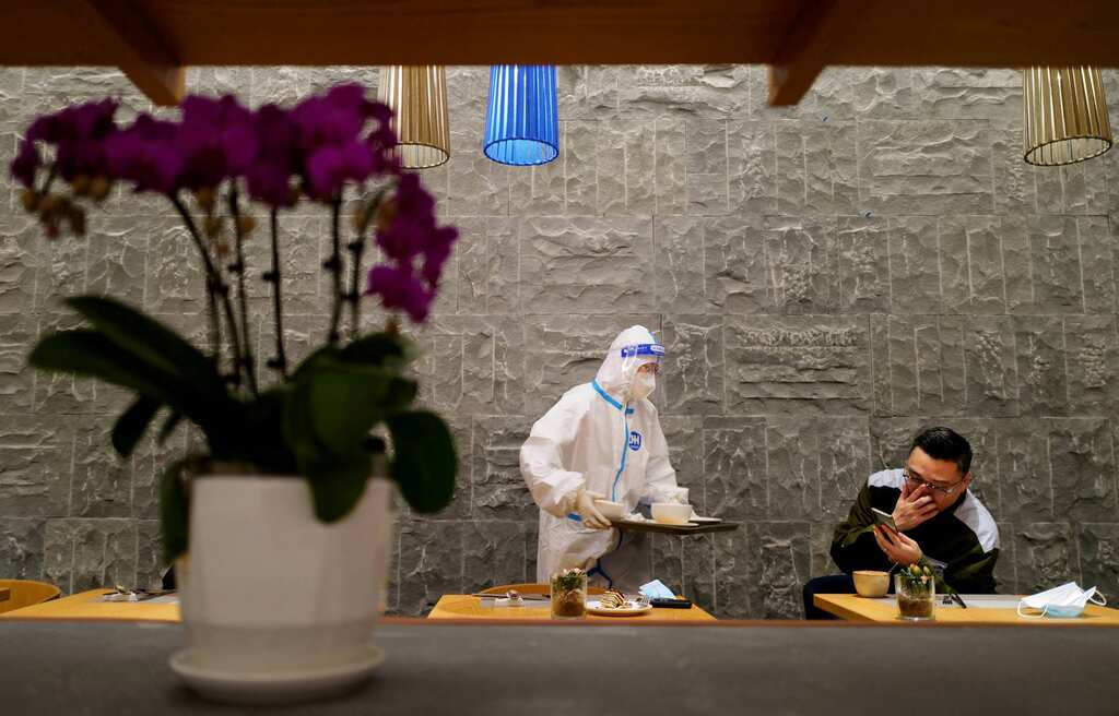 Inside Beijing's Olympic bubble: Robots are spraying disinfectant