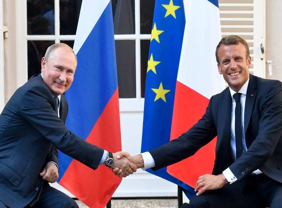 Vladimir Putin holds talks with Emmanuel Macron for 5 hours in a bid to calm tensions over Ukraine