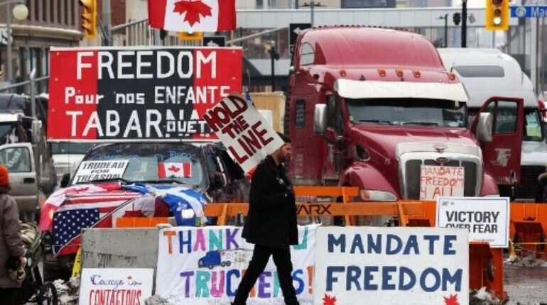 Trudeau slams Canada trucker protests, police threaten arrests