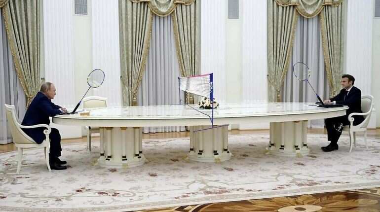 This is why Macron, Putin sat across long table in meeting, causing meme fest