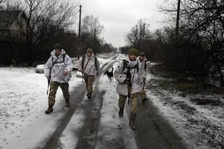 Ukraine, in a shift of tone, warns of Russia-backed military exercises