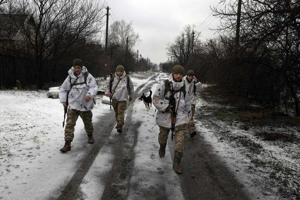 Ukraine, in a shift of tone, warns of Russia-backed military exercises