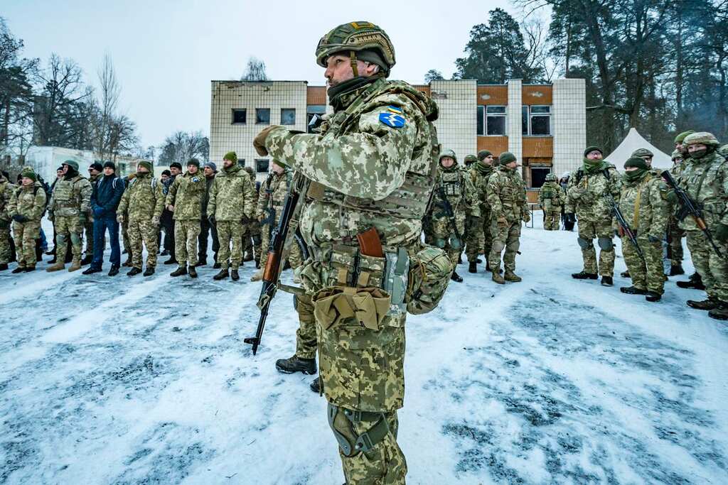 Thousands march in Kyiv in a show of support to the Ukrainian government amid Russian invasion fears