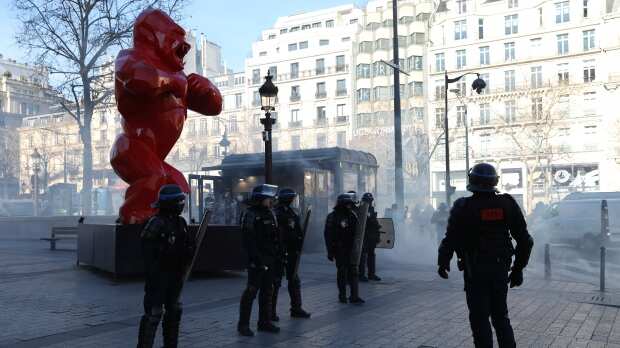 Watch: French police fire tear gas as convoy enters Paris; over 50 people arrested Watch: French police fire tear gas as convoy enters Paris; over 50 people arrested