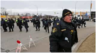 Canada police arrest protesters to open key trade route with US