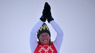 Beijing Winter Olympics: Sweden's Sandra Naeslund wins women's ski cross final, takes home gold