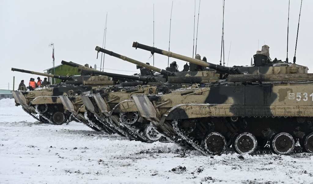 Russia 'pulling back more troops' but US says Moscow could launch 'false' pretext to invade Ukraine