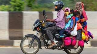 India makes helmets and safety harnesses a must for kids riding pillion