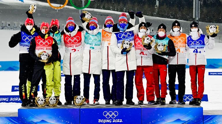 Beijing Winter Olympics: Joergen Graabak anchors Norway to gold in Nordic combined relay
