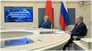 Putin oversees military drills, US says Russia can attack Ukraine 'at any time'