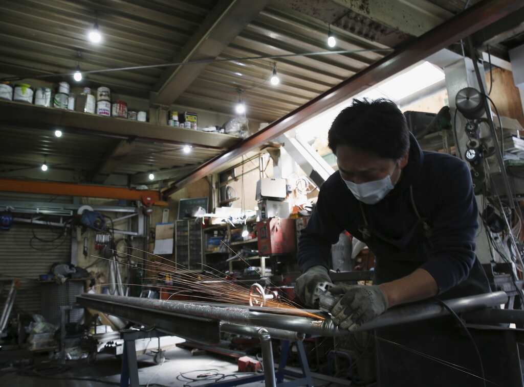 Japan's Feb factory activity growth falls to 5-month low
