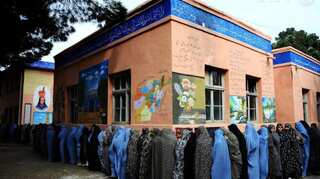 Women workers must cover up 'even with a blanket', say Afghan Taliban