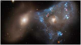 NASA's Hubble Space Telescope clicks colliding galaxies forming a strange space triangle