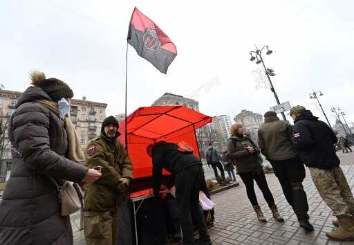 People volunteer in a battalion