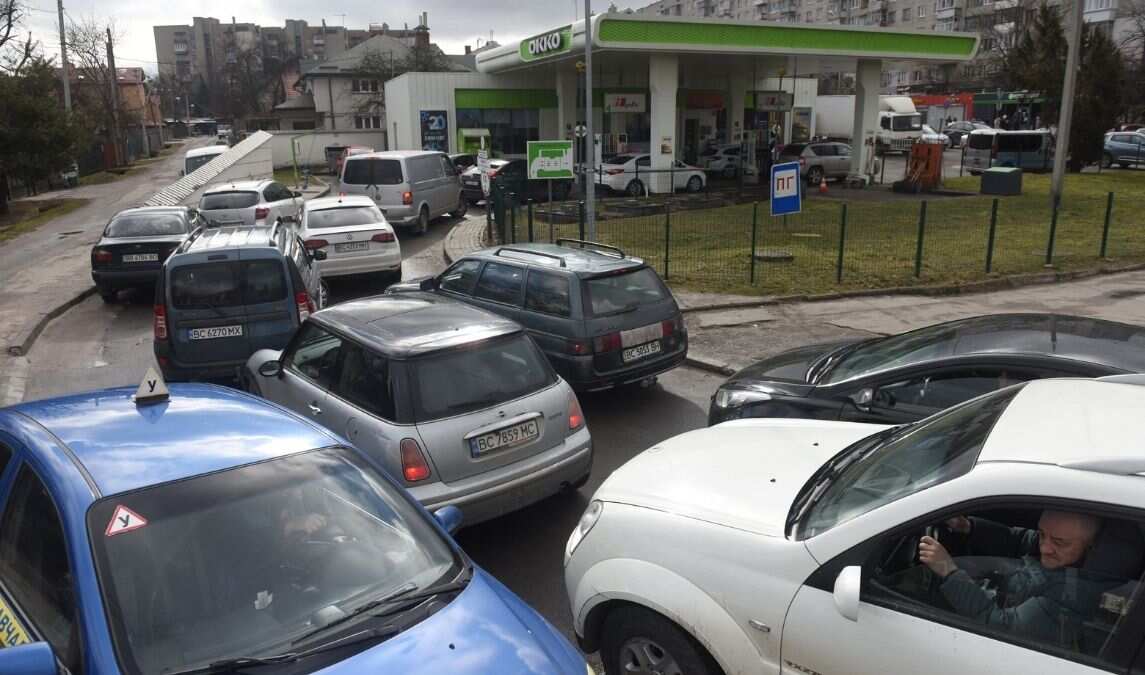 Long lines for petrol, empty supermarket shelves