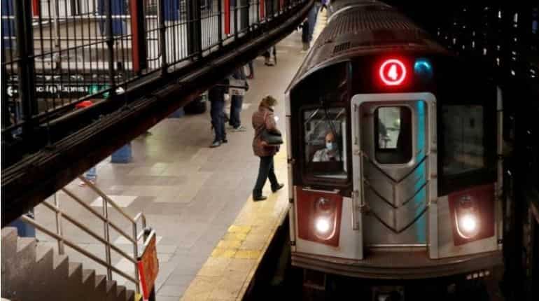 57-year-old woman gets hit in head with hammer several times at New York subway station 57-year-old woman gets hit in head with hammer several times at New York subway station