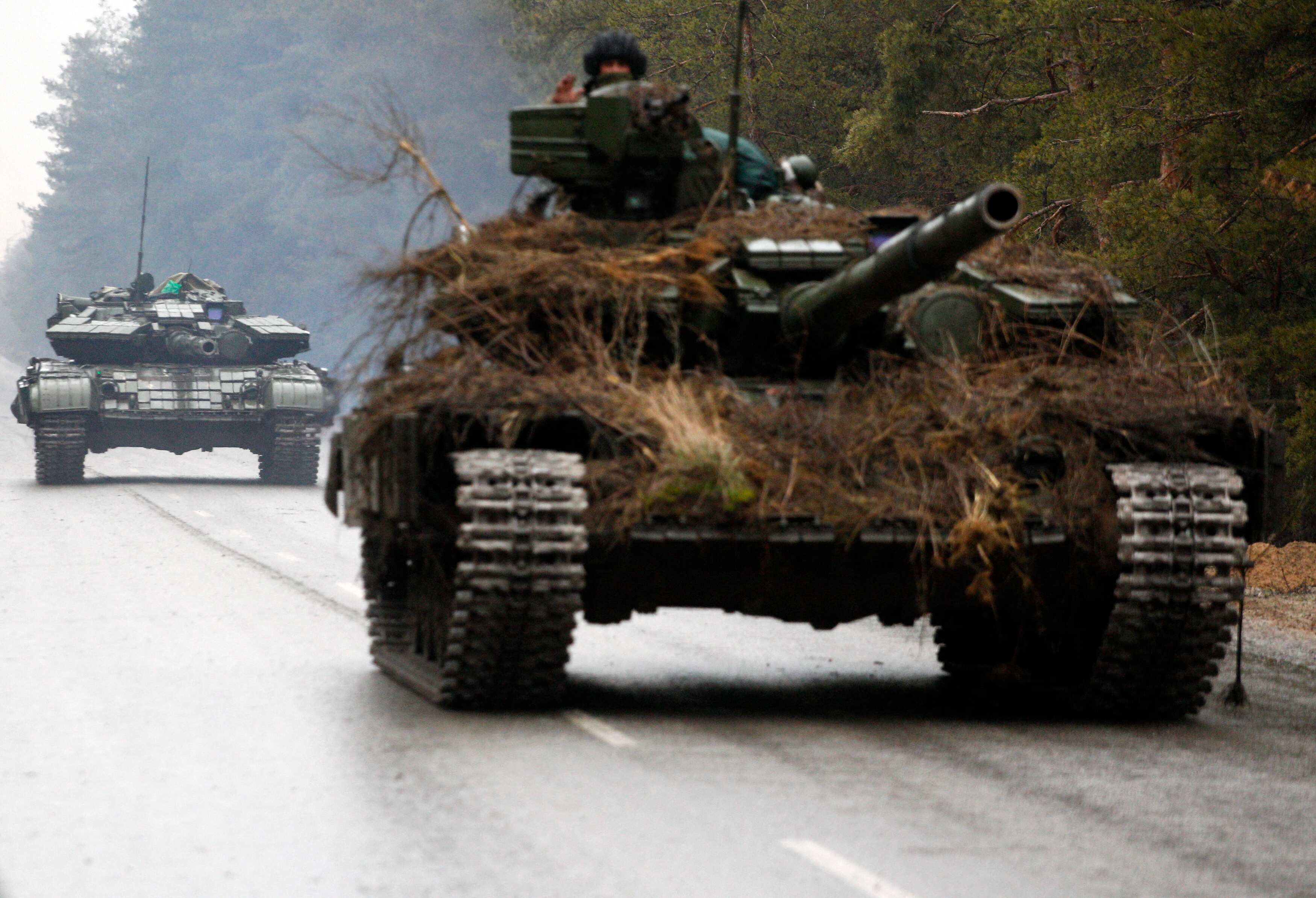 Watch: ‘Lost’ Russian tanks forced to retreat after surrounded by hundreds of Ukraine civilians