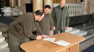 Ukraine's President Zelensky signs application to join European Union