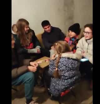 Watch: As Ukraine withstands Russian assault, children sing Kyiv anthem in bomb shelter