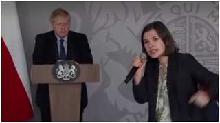 Ukrainian activist breaks down before UK PM Boris Johnson demanding no-fly zone