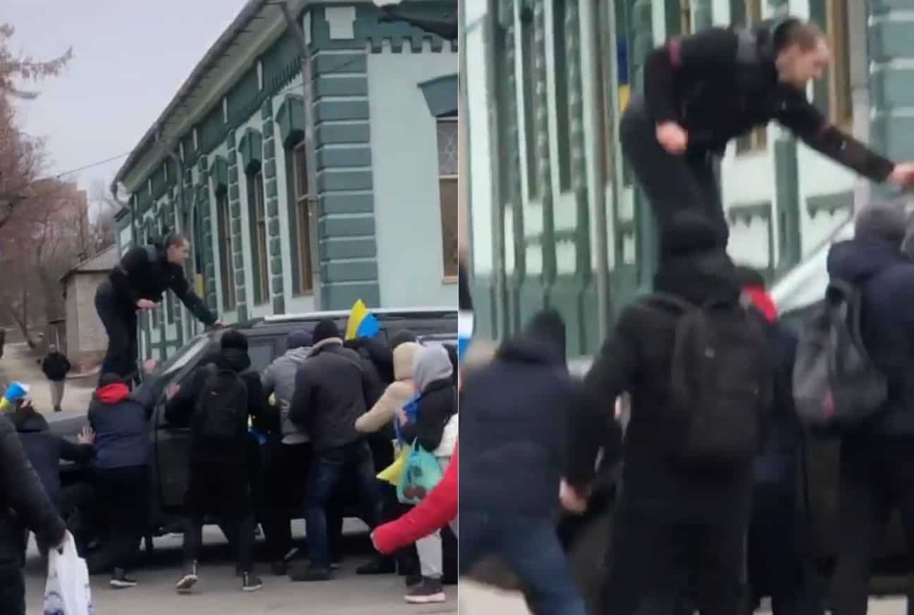 Watch: Ukrainians attack Russian military vehicle with bare hands Watch: Ukrainians attack Russian military vehicle with bare hands