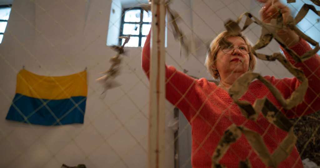 Women weave camouflage nets for Ukrainian Army as Lviv braces for a Russian assault