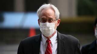 Ex-Nissan executive Greg Kelly found guilty of underreporting Ghosn's pay, gets six months in prison