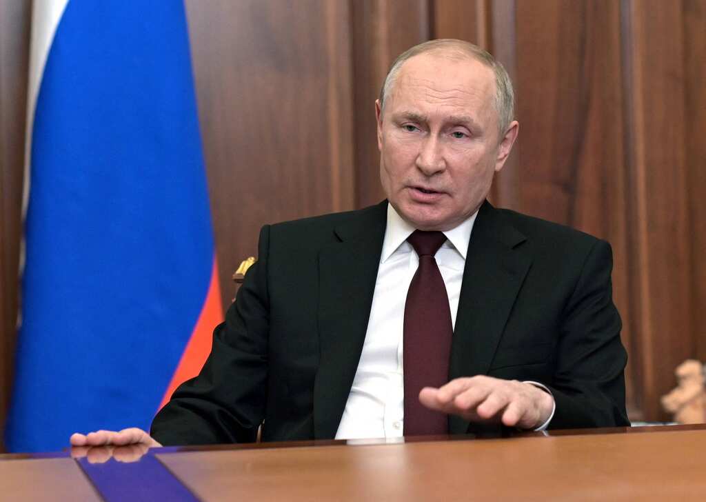 Putin sets conditions for a ceasefire as Russia builds military column near Kyiv