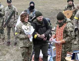 Watch: Video shows Ukrainian soldiers getting married on battlefield