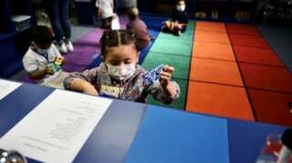 COVID-19: Weekly child cases in US drop below 100k for first time