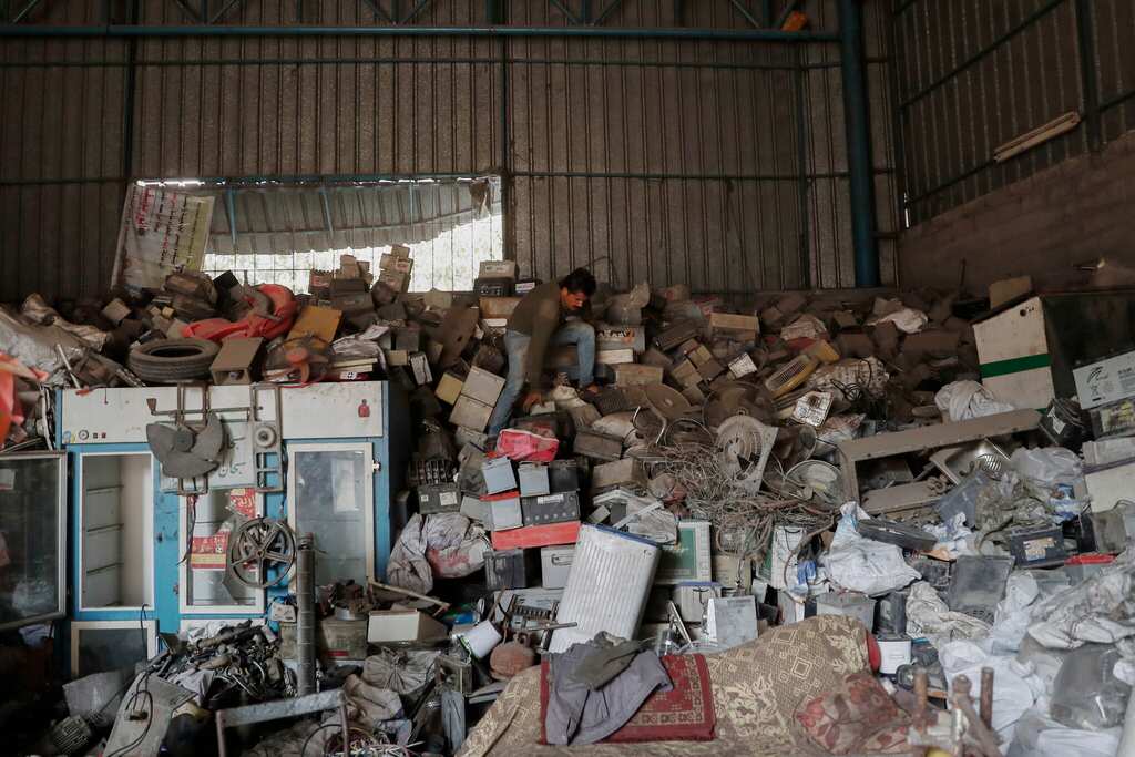 Mounds of old batteries threaten health of Gaza residents