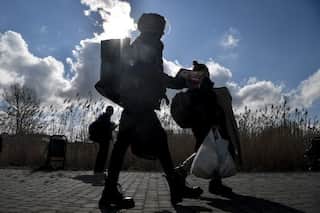 With men fighting in Ukraine, 63-year-old Nepalese father stays behind for his son