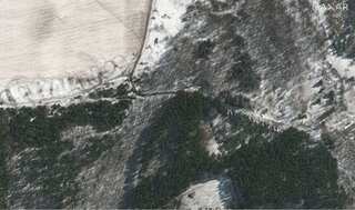 Ukraine crisis: Satellite images show Russian military convoy northwest of Kyiv has 'dispersed, redeployed'