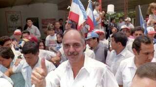 El Salvador orders arrest of former president over killing of six Jesuits in civil war