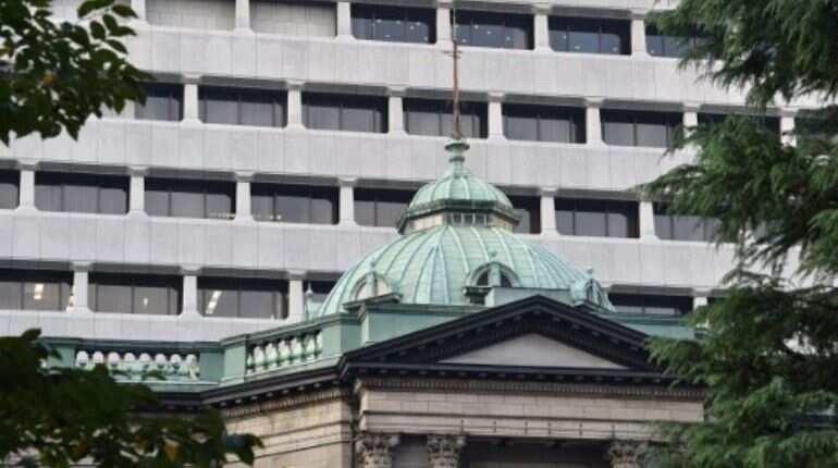 Bank of Japan says no tightening as oil stirs inflation