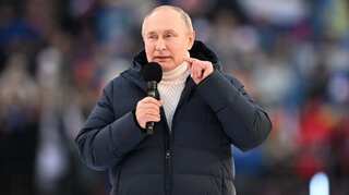 As Russians face financial crisis, President Vladimir Putin dons costly Loro Piana jacket in pro-war rally