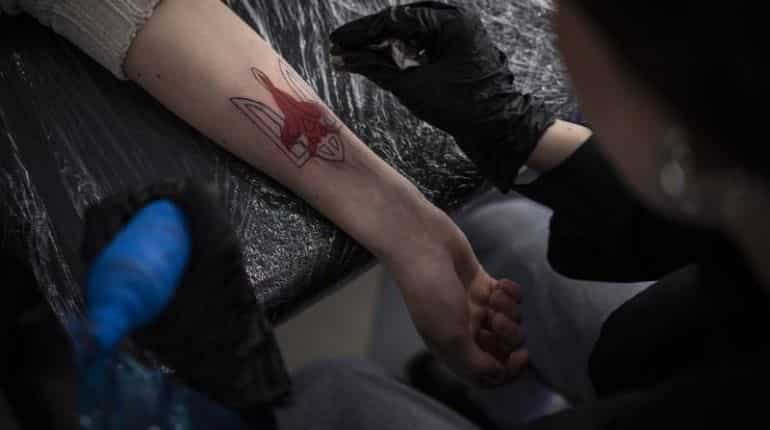 Russian invasion triggers patriotism wave in Ukraine, turns inspiring tattoos, billboards popular
