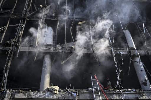 Mother shields baby daughter from shelling in Kyiv amid Ukraine-Russia war Mother shields baby daughter from shelling in Kyiv amid Ukraine-Russia war