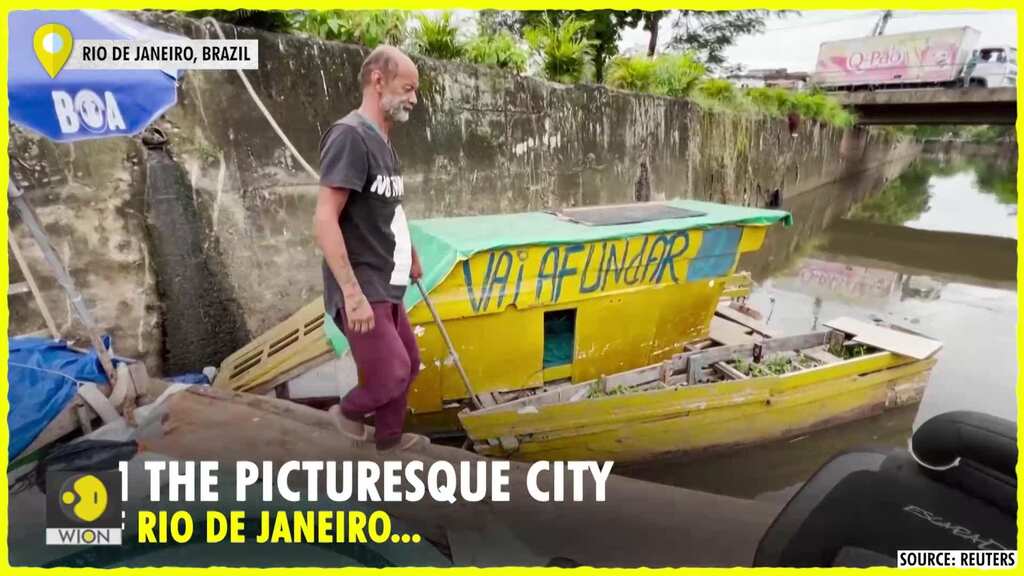 Home built from scrap floats atop river in Rio de Janeiro