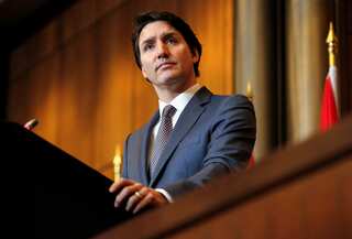 Canadian PM Trudeau strikes surprise deal to keep power until 2025