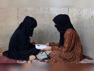 Thousands of Afghan girls return to school as Taliban end ban