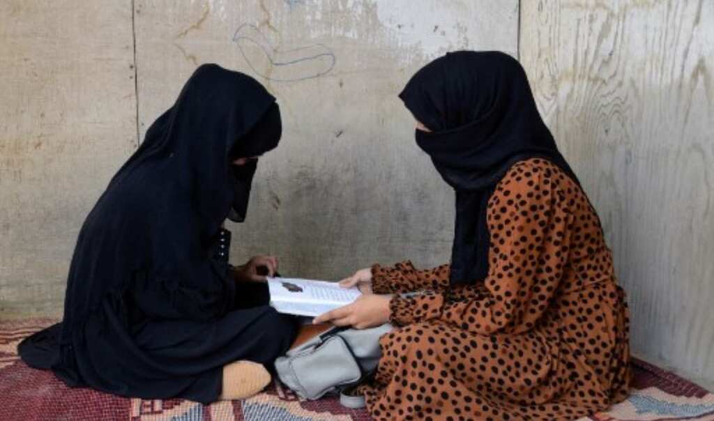 Thousands of Afghan girls return to school as Taliban end ban