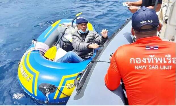 Man rows boat