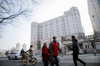 Australian journalist's Beijing trial ends with verdict deferred